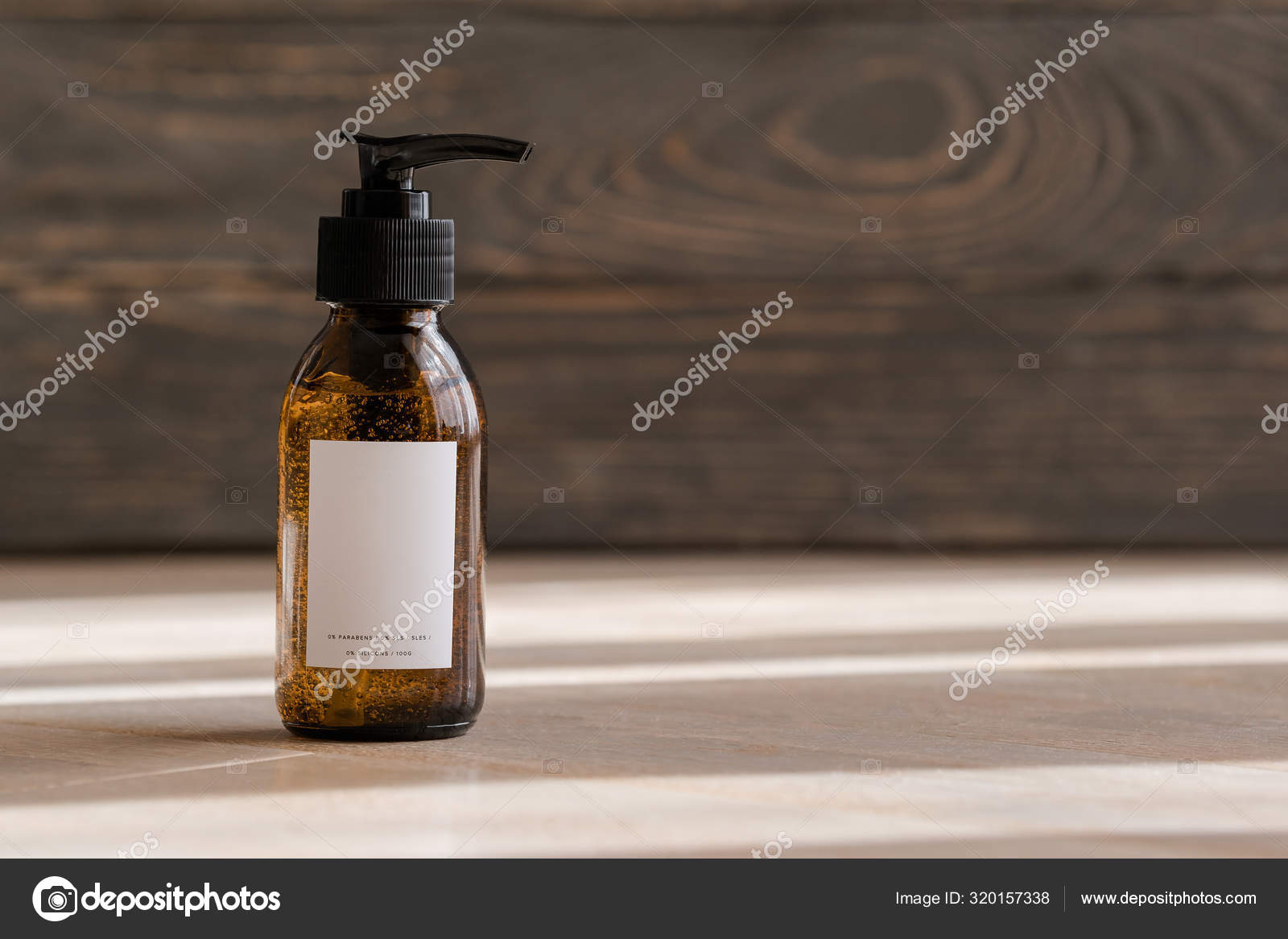 Download Cosmetic Dark Amber Bottles On Wooden Table Stock Photo Image By C Julypi 320157338