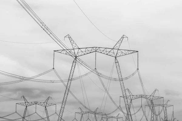 High-voltage power lines. Black and white image.