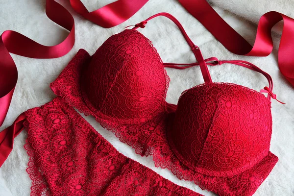 Women's lace sexy underwear of red, wine color: bra and panties. — Stock Photo, Image