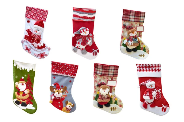 Karácsonyi dekoratív harisnyanadrág ajándékokért. Újévi zoknik és játékok. Elszigetelt, fehér háttér. — Stock Fotó