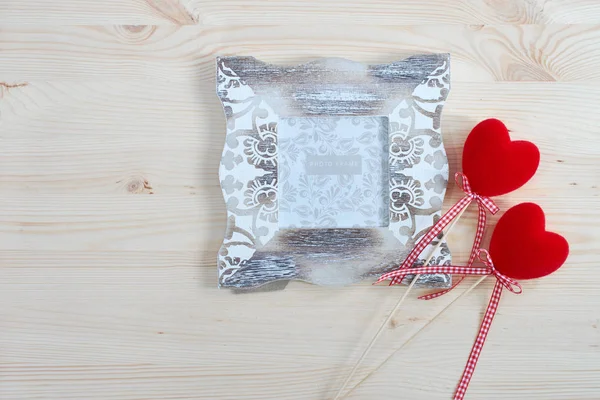Photo frame and decorative red hearts for Valentine's Day. Holiday card for lovers. — 스톡 사진