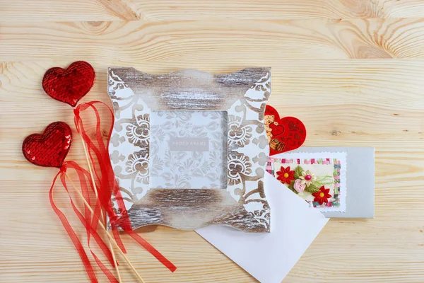 Photo frame and decorative red hearts for Valentine's Day. Holiday card for lovers. — 스톡 사진