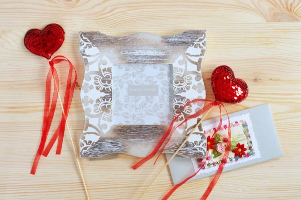 Photo frame and decorative red hearts for Valentine's Day. Holiday card for lovers. — 스톡 사진