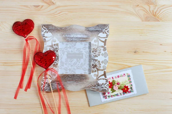 Photo frame and decorative red hearts for Valentine's Day. Holiday card for lovers. — 스톡 사진