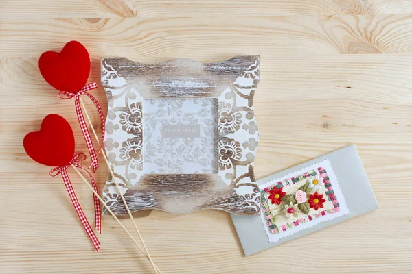 Photo frame and decorative red hearts for Valentine's Day. Holiday card for lovers. — 스톡 사진