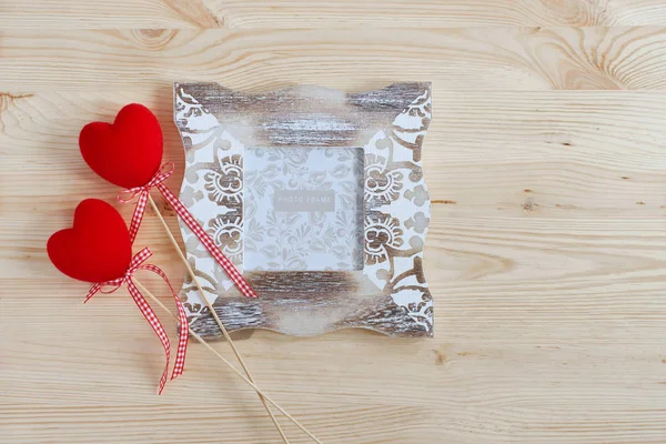 Photo frame and decorative red hearts for Valentine's Day. Holiday card for lovers. — 스톡 사진