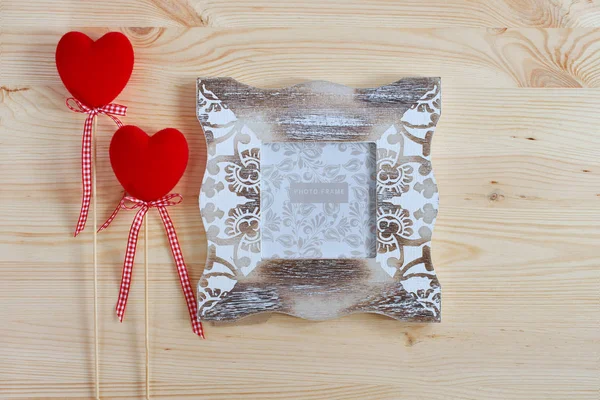 Photo frame and decorative red hearts for Valentine's Day. Holiday card for lovers. — 스톡 사진