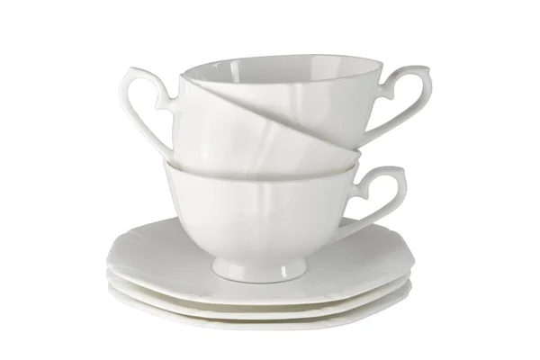 Белый фарфоровый кубок с блюдцем для чая или кофе, demitasse или чашки. Посуда на белом фоне, изолированные . — стоковое фото