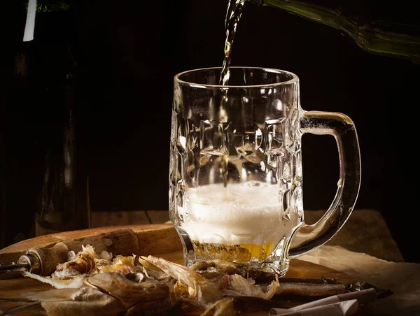 beer drink stands on a table in a glass