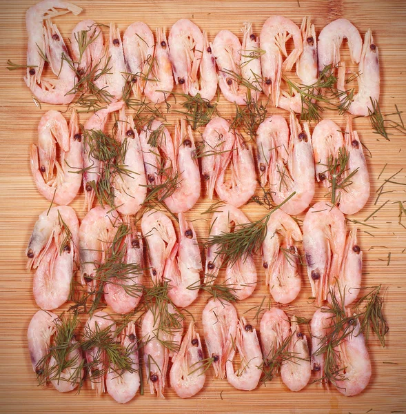 shrimp fresh frozen lie on the table