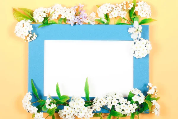 frame bright with flowers lies on a bright background there is a place for recording