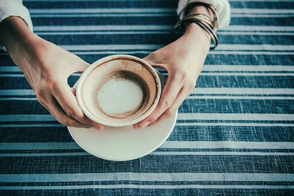 Asian woman  hands holding c