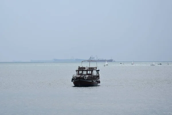 Sea with empty tourist boat — Stock Photo, Image