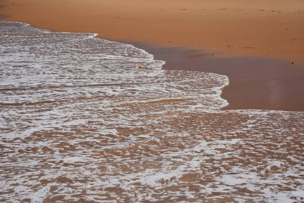 Golf en zand strand voor achtergrond — Stockfoto