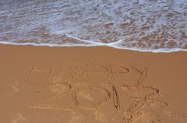 Happy 2017  written in sand, on tropical beach. — Stock Photo, Image