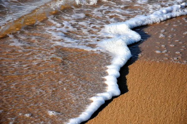 Sea wave on sand beach — Stock Photo, Image