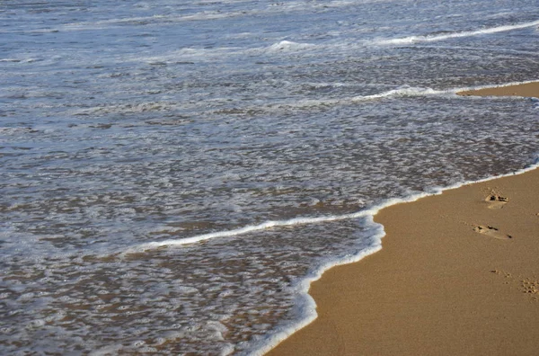 Sea wave on sand beach — Stock Photo, Image