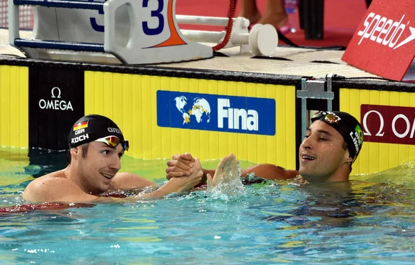 Konkurrenskraftiga simmare Lima Felipe och Koch Marco — Stockfoto