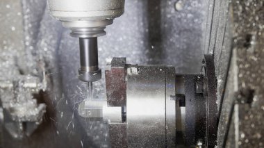 Döndürülmüş mekanizma - otomatik makine metal delme, endüstriyel arka plan, önden görünüm