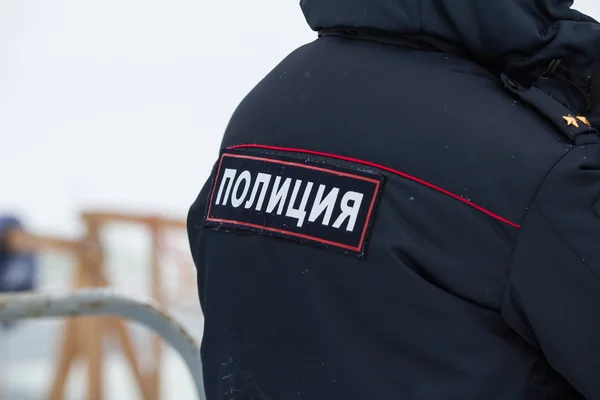 Russian police - emblem on the back, close up — Stock Photo, Image