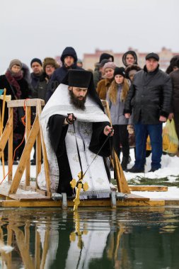 KAZAN, RUSSIA - JANUARY 19, 2017: Jesus Christs baptism holiday on kazanka river. Traditional winter bathing in center of city clipart