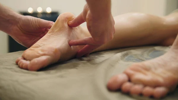 Oil massage for footstep. Relaxation treatment for young female — Stock Photo, Image