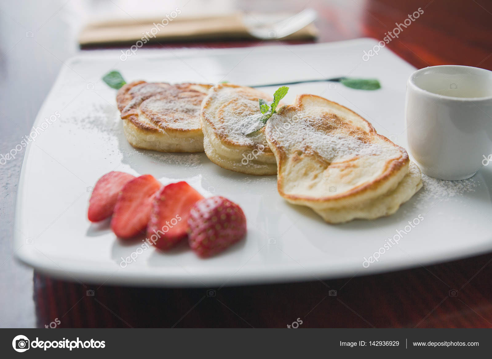 Hot Pancake With Strawberry And Sauce Fritters Of Cottage Cheese