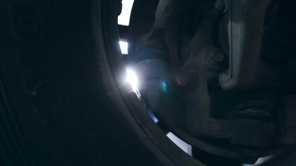 Roue et flash du soleil - Garage service automobile 