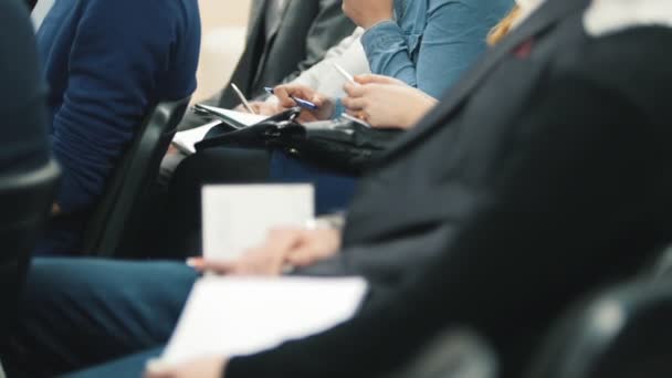 Audience meeting - eople sitting and listen to the conference or presentation, workshop, master class — Stock Video