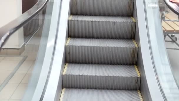 Escalator stairs in mall - moving staircase running up — Stock Video