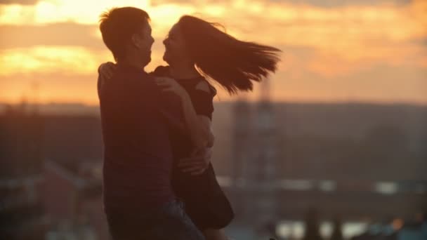 Loving Couple Romancing at sunset in slow motion — Stock Video