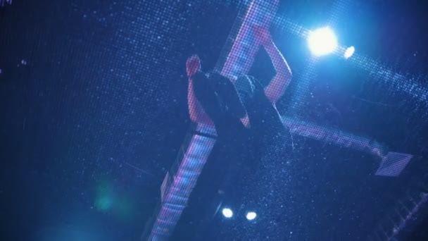 Young man topless acrobat jumping on the trampoline - slow-motion, bottom view — Stock Video