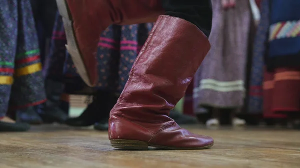 Russian folk dance - foot in boots of boy dancing — Stock Photo, Image