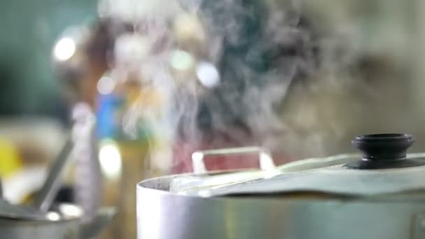 Steam from a pot in the restaurant kitchen — Stock Video