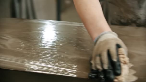 Working in the concrete industry - washing concrete slab with special solution — Stock videók