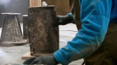 Concrete industry - worker putting the figure out from the form