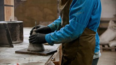 Concrete industry - worker preparing the form for working with concrete