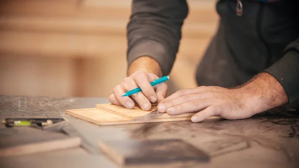 Carpentry working - making marks on the wood — Stock Photo, Image