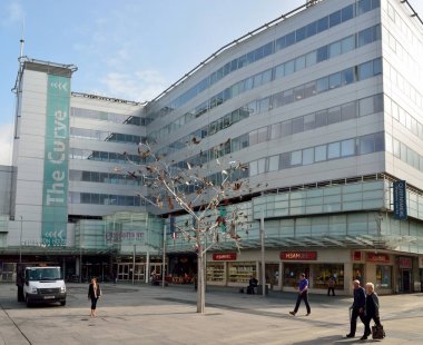 Exterior view of shopping mall building on High Street in Slough clipart