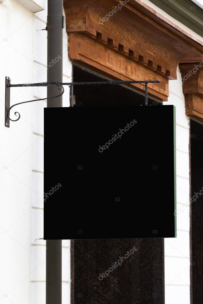 Black signboard on wall. Square shape mock up.