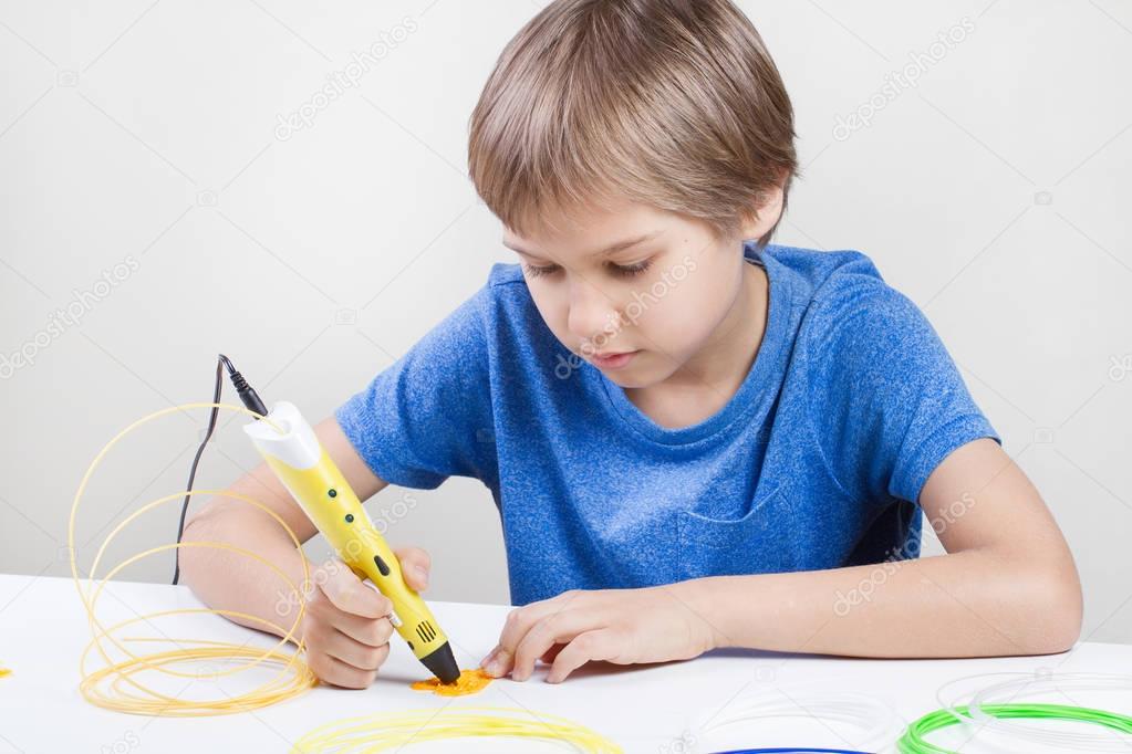 Child using 3d drawing pen. Creative, technology, leisure, education concept