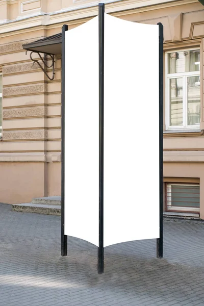 Mock up. Blank outdoor advertising column outdoors, public information board in the street. — Stock Photo, Image