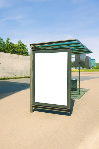 Blank billboard for advertisement, in a bus stop at the street