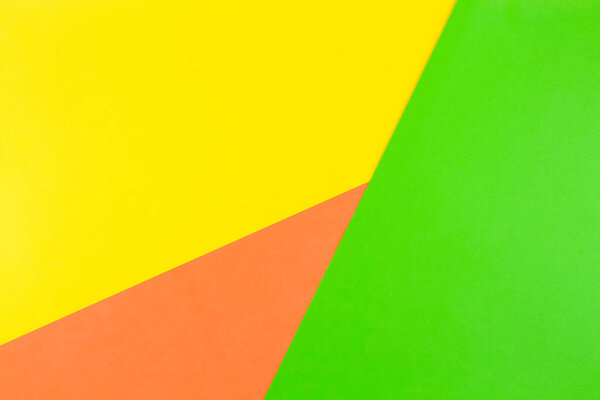 Желтый, зеленый и оранжевый цвет бумаги фон

