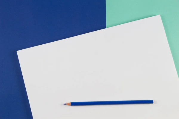 Blue colored pencils on blue color background Royalty Free Stock Photos