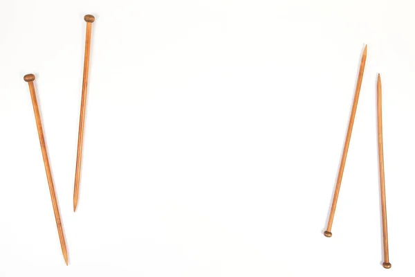 Wooden knitting needles on white background — Stock Photo, Image