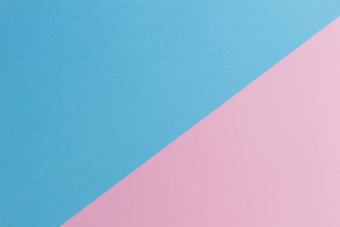 Kağıt arka plan yumuşak pembe ve açık mavi pastel renkli.