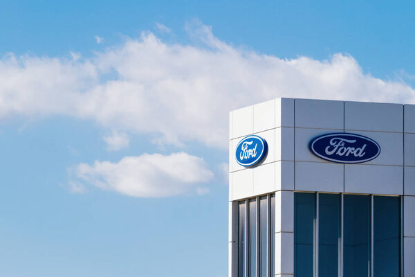 Finestrat, Spain - November 14, 2017: Ford motor company logo on dealership building on November 14, 2017 in Finestrat, Alicante province, Spain.