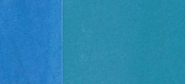 Blue playground or sports ground rubber crumb cover grunge background
