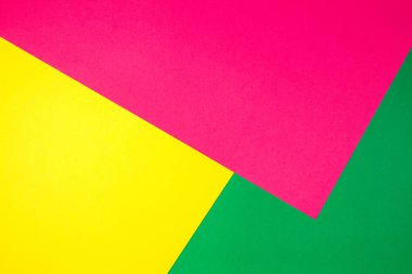 Sarı, yeşil ve pembe tonları ile kağıtları geometri düz kompozisyon arka planını renklendirin
